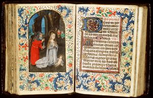 The Nativity: the adoration of the Christ-child by Mary and St. Joseph, who is holding a candle