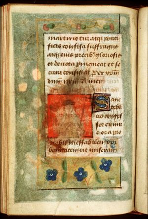 St. Bavo of Ghent holding a sword(?)