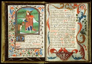 St. John the Baptist holding a lantern and a book, with the Lamb of God (Agnus Dei)