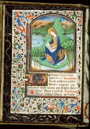The Evangelist St. John writing on the island of Patmos, with his symbol the eagle