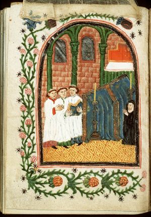 A funeral service in a church, with a kneeling nun (donor?)