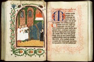 A funeral service in a church, with a kneeling nun (donor?)
