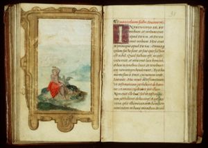 The Evangelist St. John writing on the island of Patmos, with his symbol the eagle