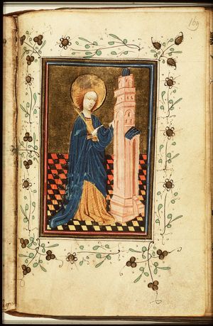 St. Barbara holding a palm, before the tower