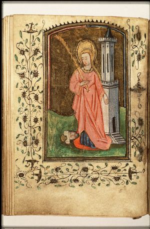 St. Barbara holding a palm, a tower beside her, Dioscuros at her feet