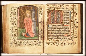 St. Barbara holding a palm, a tower beside her, Dioscuros at her feet