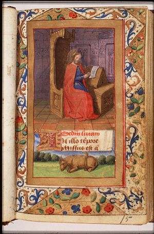 The Evangelist St. Luke writing, with his symbol the ox