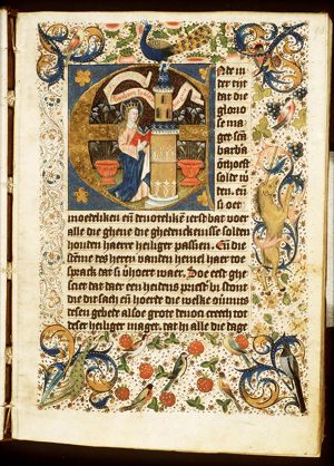 St. Barbara holding a book, a tower beside her