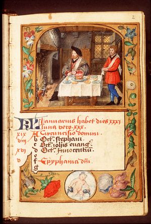 January: a man dining and warming himself at a fire