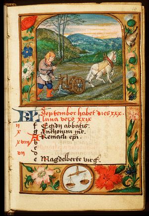 September: a man ploughing