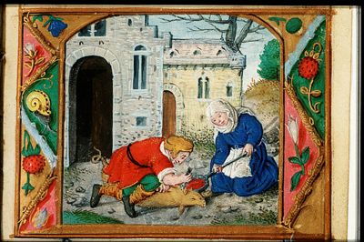 December: a man and a woman slaughtering a pig