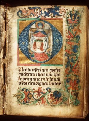 St. Veronica holding up the veil with the image of Christ (Vera Icon)