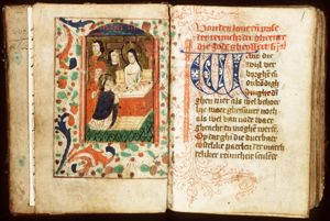 St. Veronica holding up the veil with the image of Christ (Vera Icon); IHS monogram