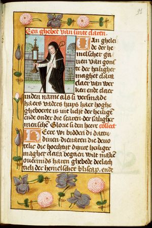 St. Clare of Assisi holding a monstrance and a pastoral staff