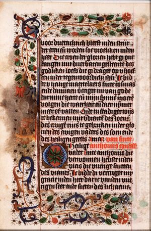 St. Antony Abbot of Egypt holding a bell and a staff
