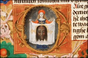 St. Veronica holding up the veil with the image of Christ (Vera Icon)