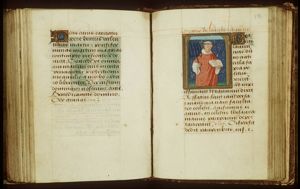 St. Laurence of Rome holding a gridiron and a book