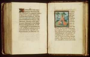 The Evangelist St. John writing on the island of Patmos