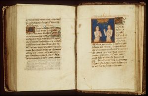 An angel releasing two souls from Purgatory