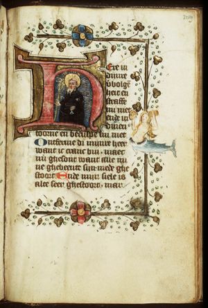 St. Antony Abbot of Egypt holding a staff and a bell