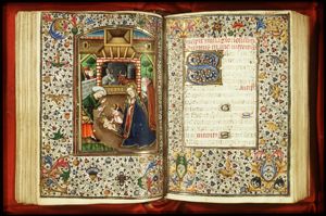 The Nativity: the adoration of the Christ-child by Mary, St. Joseph, an angel, and a midwife holding a candle