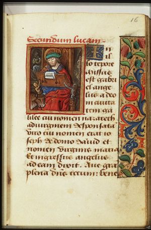 The Evangelist St. Luke writing, with his symbol the ox