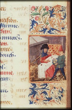 January: a man dining and warming himself at the fire