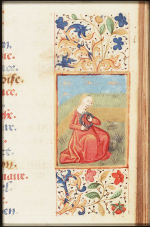 April: a woman holding a wreath of flowers