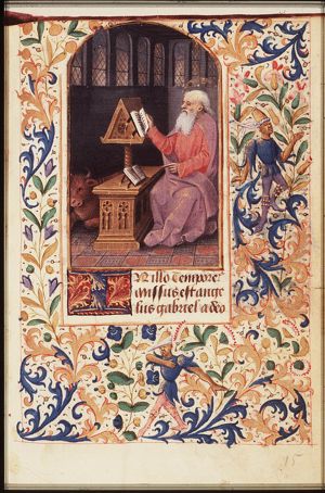 The Evangelist St. Luke reading, with his symbol the ox