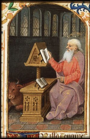The Evangelist St. Luke reading, with his symbol the ox