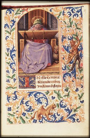 The Evangelist St. Mark writing, with his symbol the lion