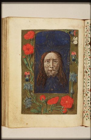 St. Veronica holding up the veil with the image of Christ (Vera Icon)