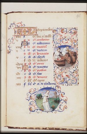 September: two men making wine, one of them treads grapes