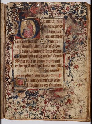 Madonna: Mary sitting on a cushion on the ground, holding the Christ-child