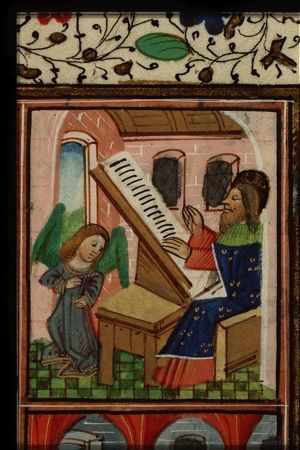 The Evangelist St. Matthew reading, with his symbol the angel