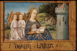 St. Barbara holding a book, before the tower