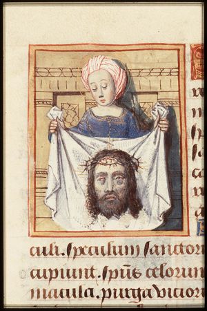St. Veronica holding up the veil with the image of Christ (Vera Icon)