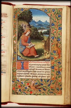 The Evangelist St. John writing, with his symbol the eagle on Patmos