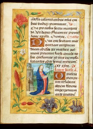 St. Barbara holding a book, before the tower