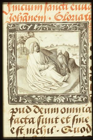 The Evangelist St. John with his symbol the eagle on Patmos