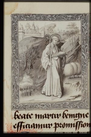 St. Benignus holding a staff and a book