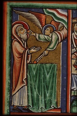 Isaiah's vision: an angel purifies his lips with a burning coal from the altar