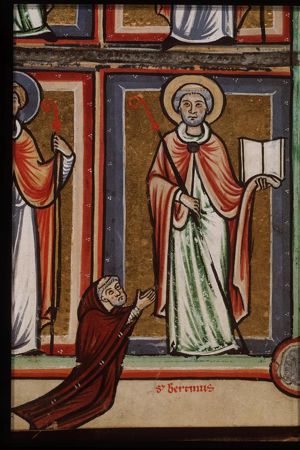 St. Bertin of Artois holding a staff and a book, with a kneeling donor