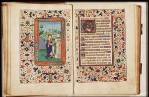 St. Barbara holding a book, before the tower
