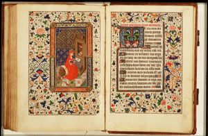 St. Jerome as a cardinal with the lion, seated at his desk in front of a bookcase