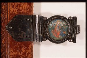 Madonna: Mary sitting on the ground, holding the Christ-child