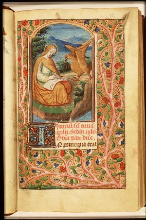 The Evangelist St. John writing on the island of Patmos, with his symbol the eagle