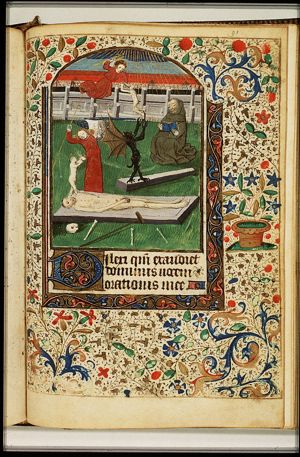 A burial on a graveyard, with angels and a devil fighting over the soul