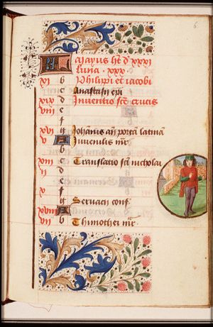 May: a man holding a bunch of flowers