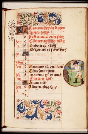 November: a man with pigs
